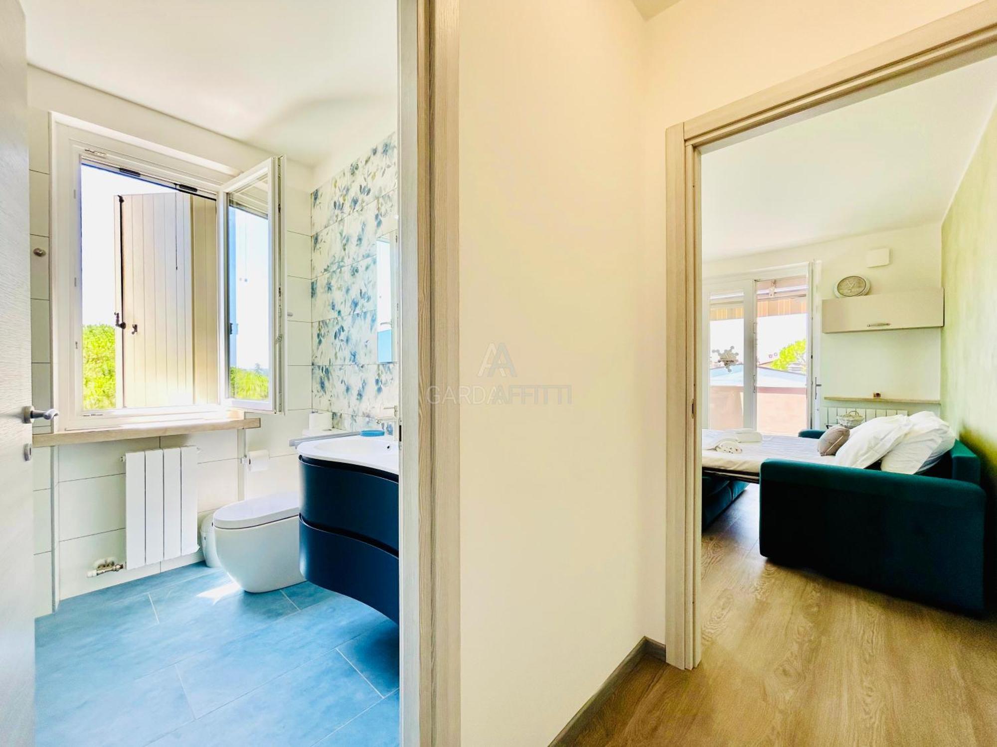 Ossidiana Apartment - Vista Lago - Centrico 西尔米奥奈 外观 照片