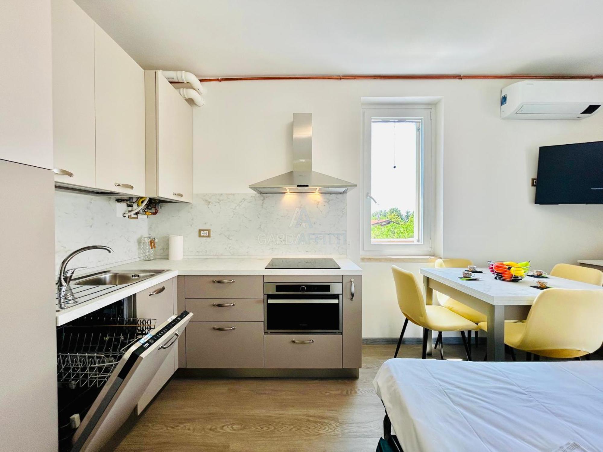 Ossidiana Apartment - Vista Lago - Centrico 西尔米奥奈 外观 照片
