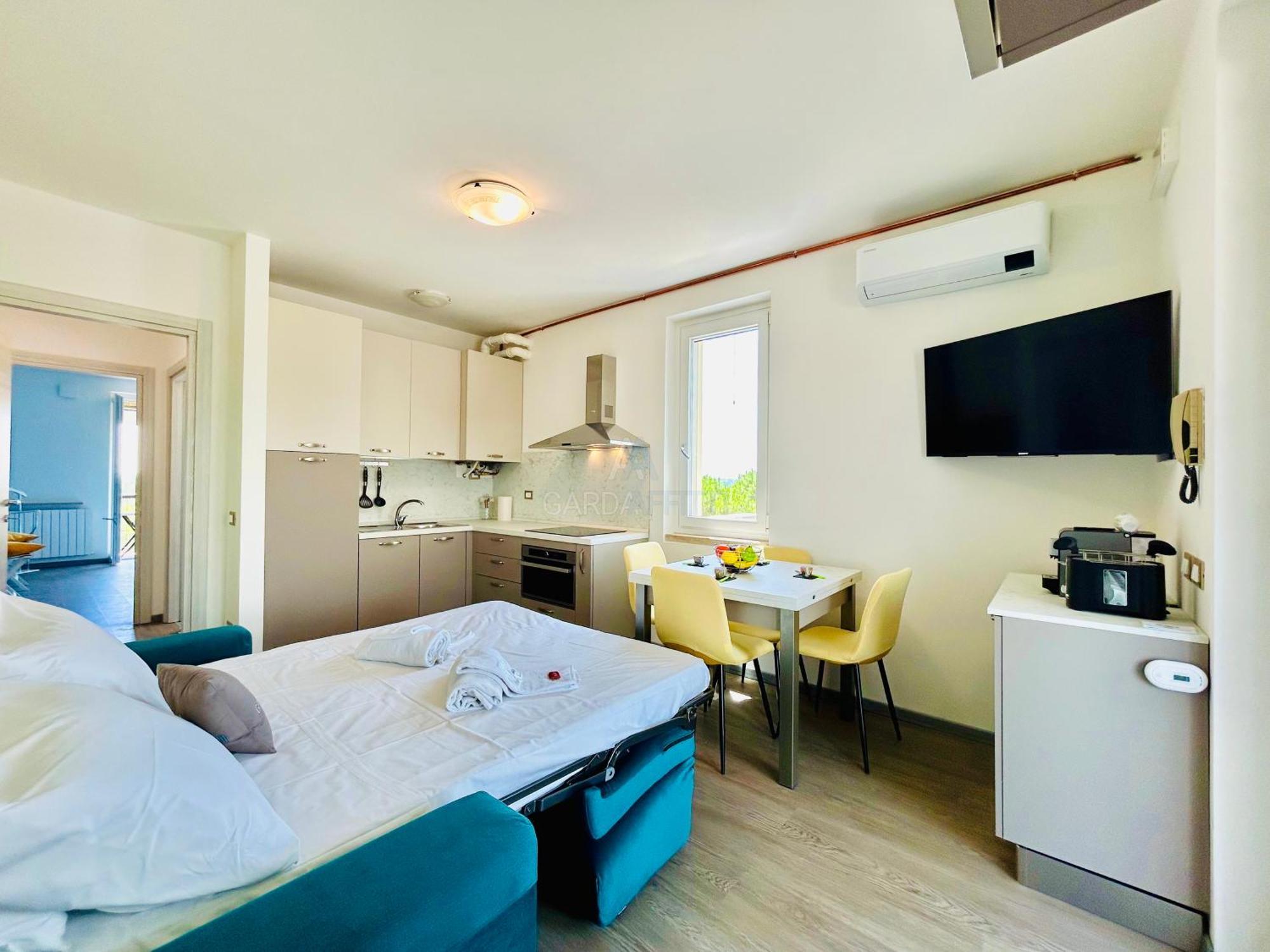 Ossidiana Apartment - Vista Lago - Centrico 西尔米奥奈 外观 照片