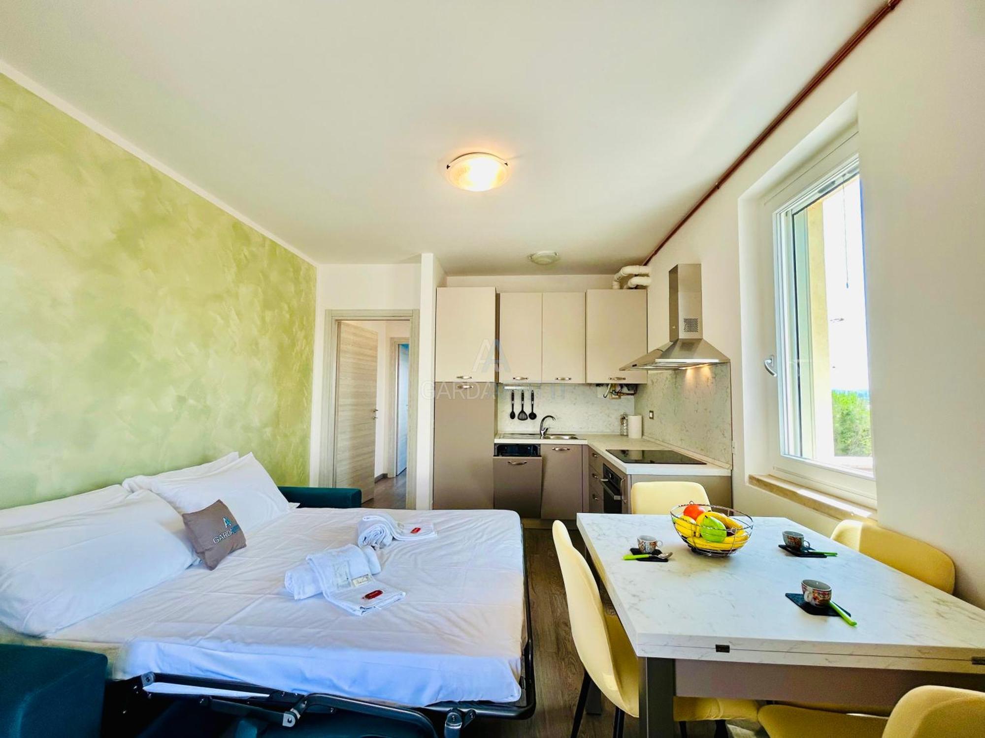 Ossidiana Apartment - Vista Lago - Centrico 西尔米奥奈 外观 照片